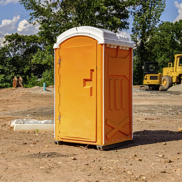 how often are the porta potties cleaned and serviced during a rental period in Badger